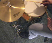 Playing the hi-hat with the cymbals closed